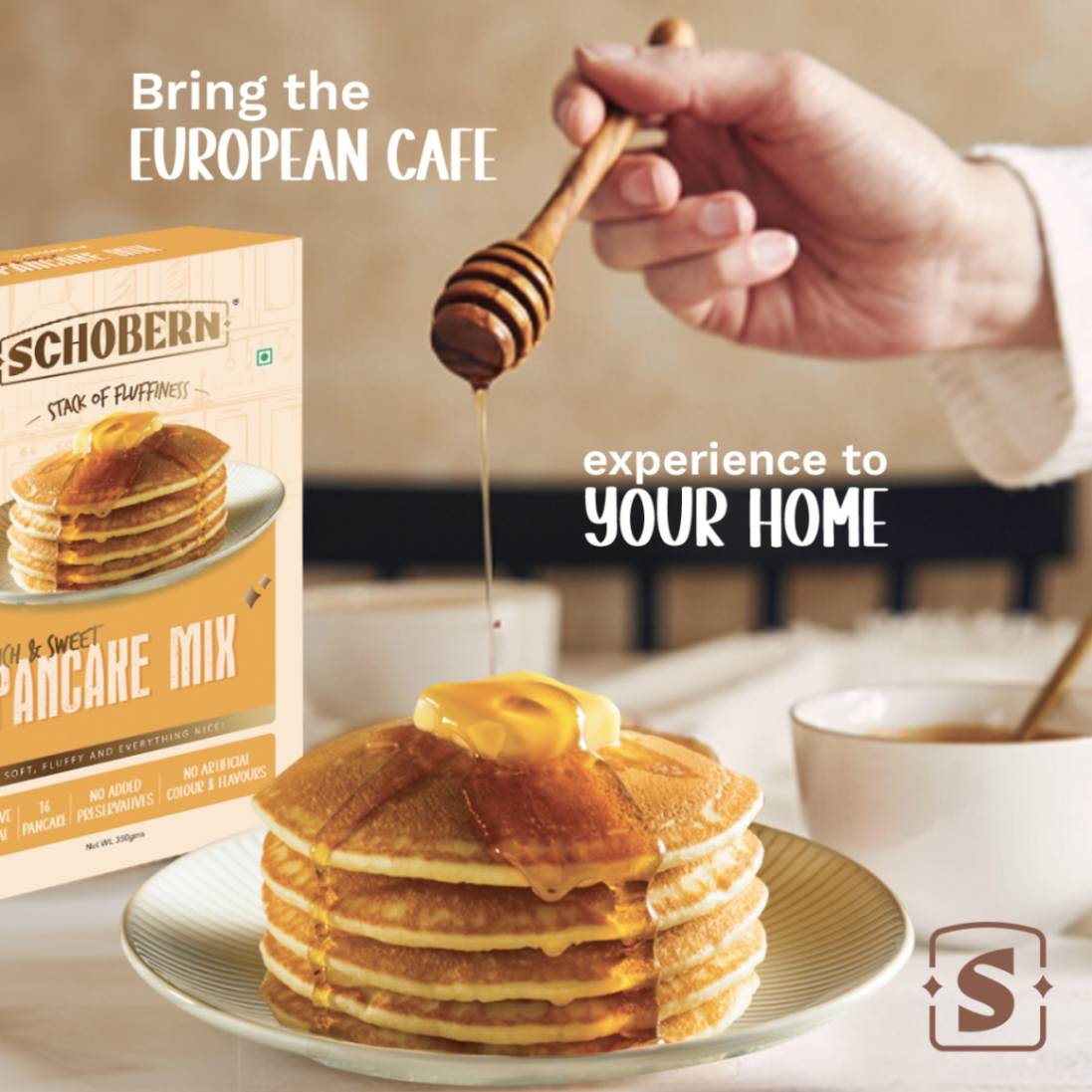 A pack of Schoenberg Rich and Sweet Pancake Mix with an image of stacked pancakes on the front, along with text that highlights the product features like high protein content and no adulteration.
